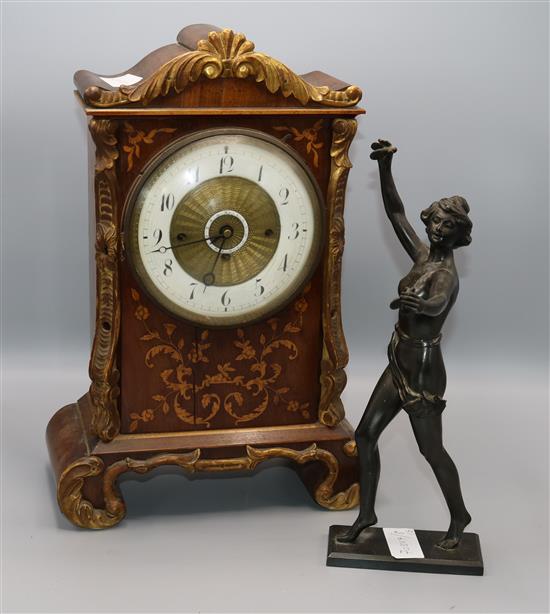 Inlaid mantel clock and figure of semi-clad lady